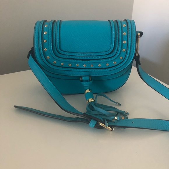 Charming Charlie Handbags - Turquoise Saddle Crossbody Purse